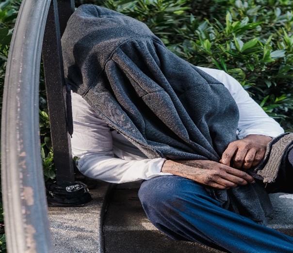 Homeless Man Sleeping In The Park